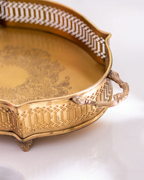 Detailed edge pattern of luxury gold decorative serving tray, with artistic cut-out design, ideal for upscale home decoration.