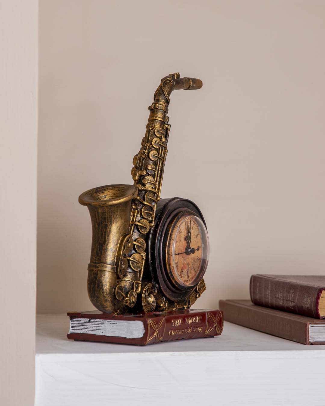 'Saxophone With Clock' Placed On Book Stand - The Decor Kart