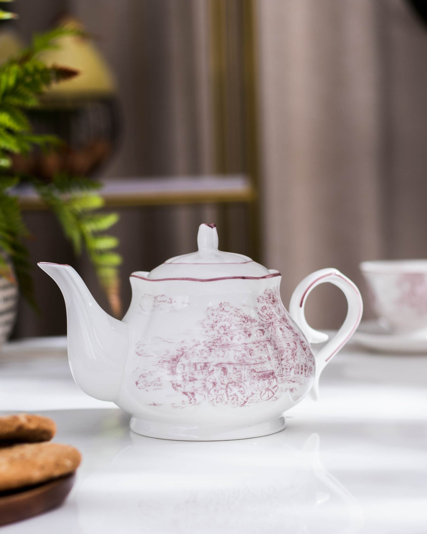 Ceramic Hampshire Floral Kettle with classic Baroque pattern on a kitchen island.