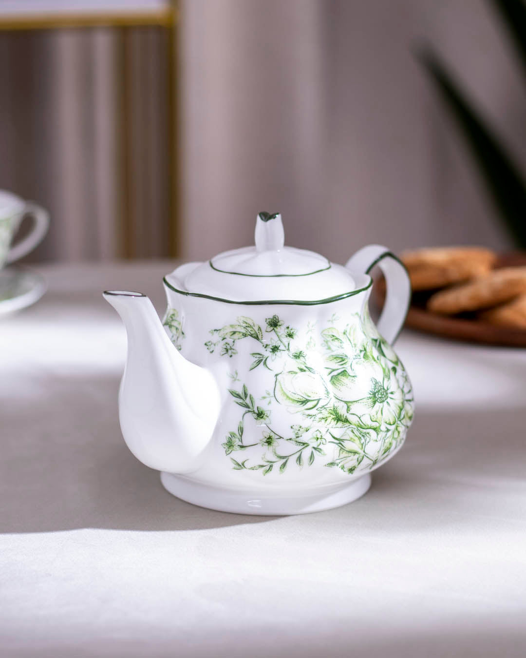 Traditional-style Devonshire Green Floral Tea Kettle made of high-quality ceramic, perfect for an elegant tea time experience.