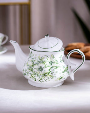 Decorative Devonshire Floral Tea Kettle crafted from durable ceramic with a unique green floral motif, close-up view.